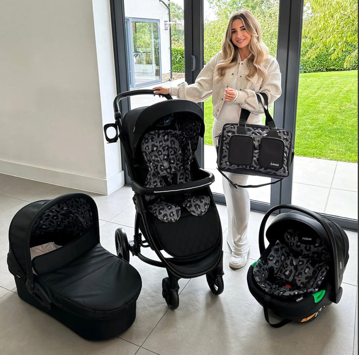 MB200i Dani Dyer Black Leopard iSize Travel System